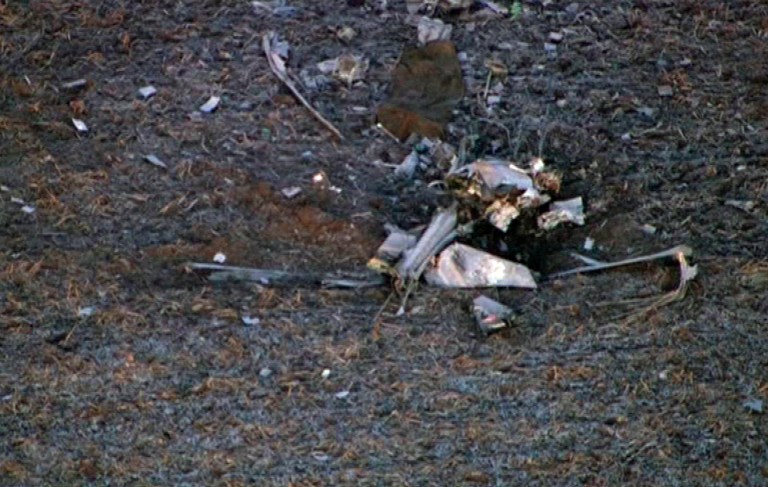   This Tuesday, Dec. 11, 2012, aerial photo taken from video provided by WLS-TV in Chicago shows the wreckage of a medical helicopter that crashed in a field near Rochelle, Ill., while traveling between two northern Illinois hospitals. The pilot and two nurses were killed in the crash. No patients were aboard when the helicopter went down Monday night about 70 miles west of Chicago. A spokesman for Rockford Memorial Hospital says its helicopter was flying to pick up a patient at a Mendota hospital. (AP Photo/Courtesy WLS-TV in Chicago)  