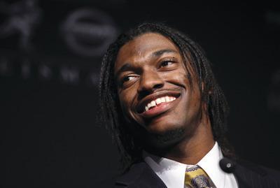 Craig Ruttle/APQuarterback Robert Griffin III won the Heisman Trophy after completing 72.4 percent of his passes for 4,293 yards and 37 touchdowns at Baylor last year.