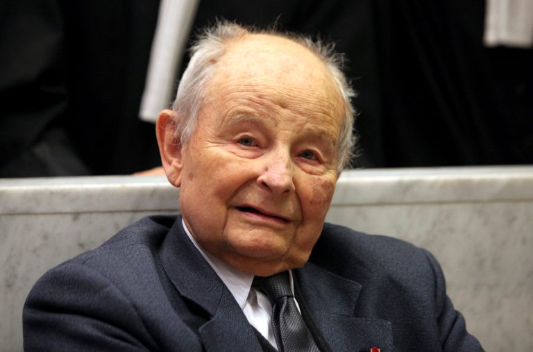 FILE - In this May 21, 2013 file photo, Jacques Servier, founder of Servier Laboratories, is pictured during the opening of the trial of the so-called Mediator case, a drug allegedly linked to hundreds of deaths, at Nanterre's court house, outside Paris. Servier, the founder of France's second-largest pharmaceutical group who became ensnared in a scandal over a diabetes drug widely used for weight loss, has died. He was 92. (AP Photo/Thibault Camus, File)