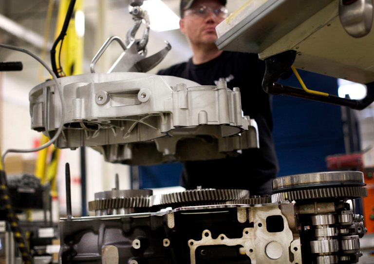 Jerry Drury works on a truck engine assembly line at Volvo Trucks' powertrain manufacturing facility.