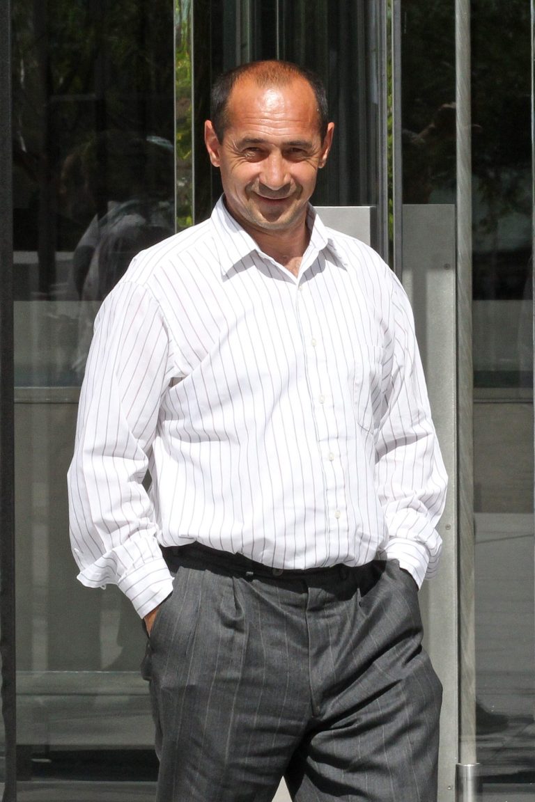 Anatoliy Baranovich, 47, leaves the Federal Courthouse Wednesday, June 25, 2014, in Salt Lake City. A judge has ordered a Ukrainian truck driver to serve two years' probation for screaming aboard a flight from Boston to Salt Lake City that a wing had caught fire. Federal Judge Robert Shelby on Wednesday also sentenced 47-year-old Anatoliy Baranovich of Portland, Oregon to pay $57,000 in damages to Delta Airlines for damaging a plane door when he tried to yank it open. Baranovich told authorities he had been drinking heavily for 50 days before causing the melee. (AP Photo/Rick Bowmer)