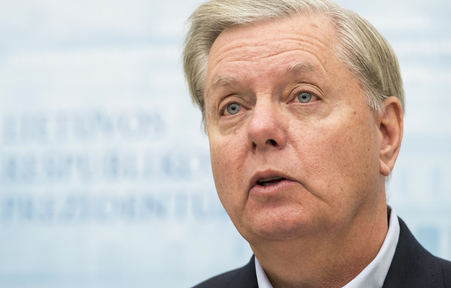 Lindsey Graham defends Trump travel ban after court rejects it