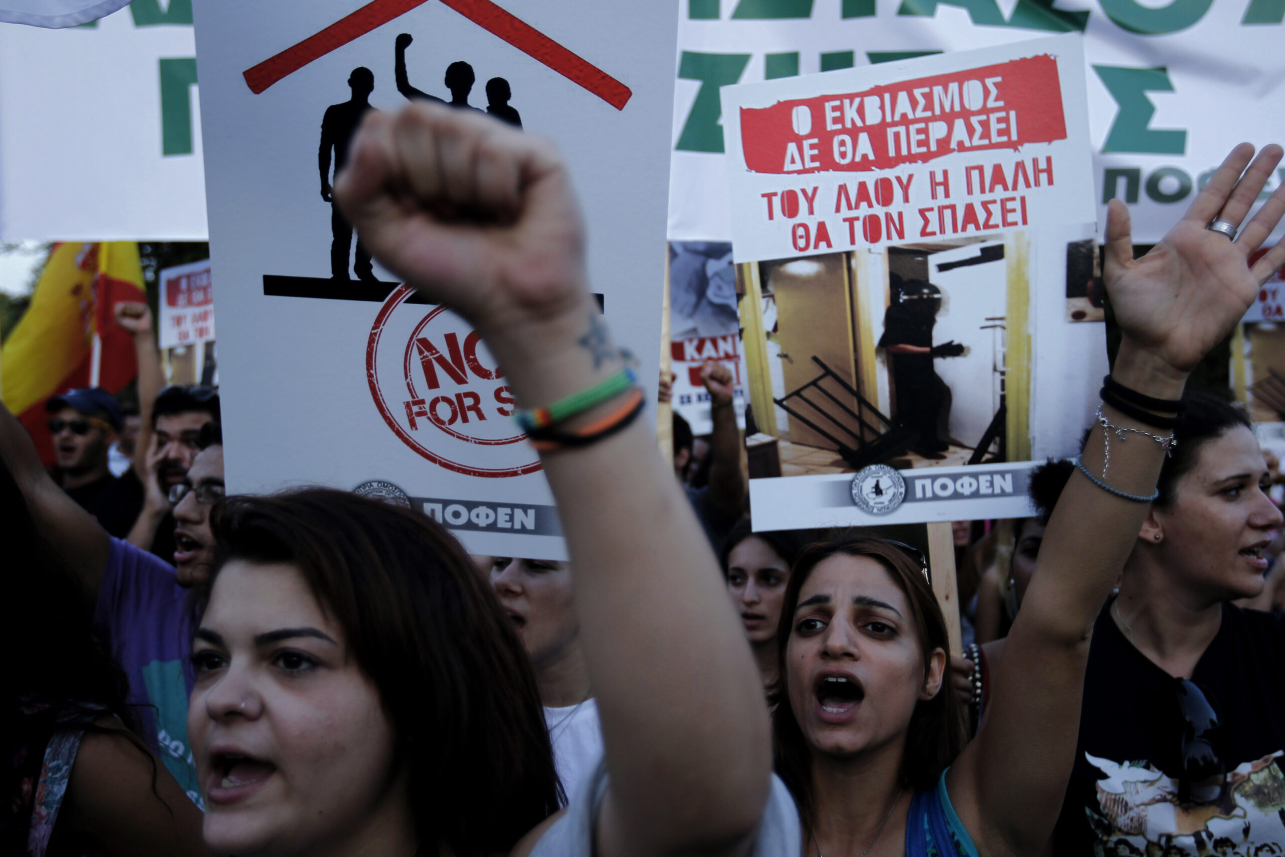 Cypriots protest proposed bank loan legislation