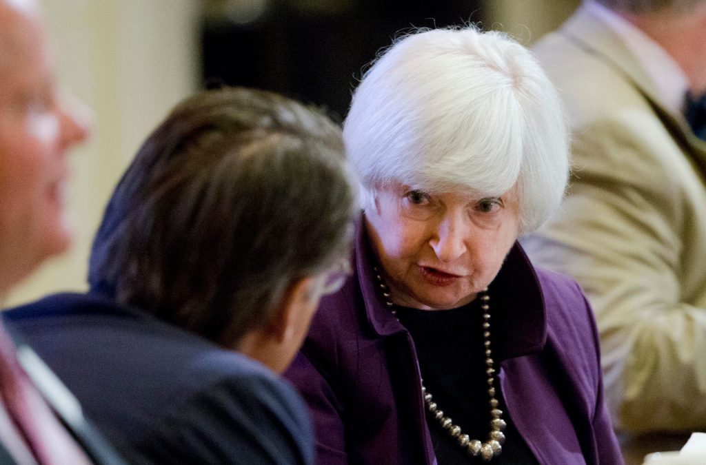 Fed holds off on rate hike, still sees two hikes this year