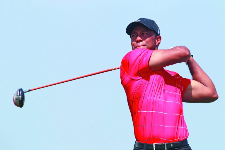 John Raoux/AP
Tiger Woods will be in a group with Rory McIlroy at the Barclays this week.