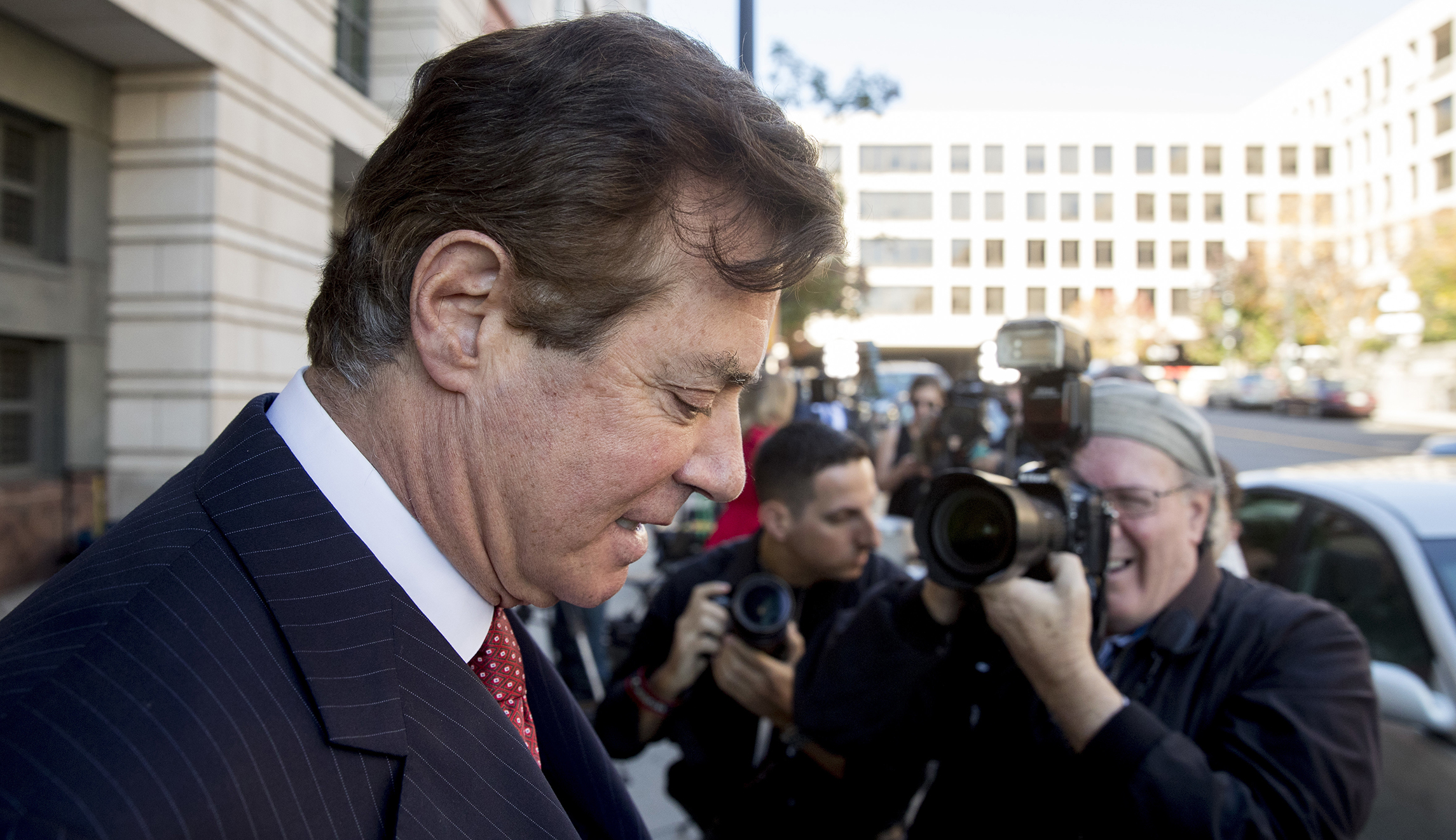 Paul Manafort’s attorneys say he is not a flight risk, but judge resists lifting house arrest right away
