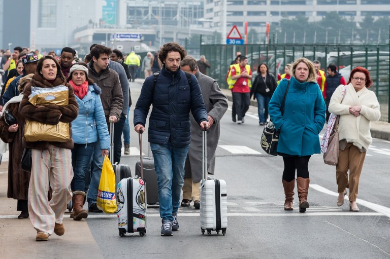 Explosions rocked the Brussels airport and the subway system Tuesday, just days after the main suspect in the November Paris attacks was arrested in the city. (AP Photo/Geert Vanden Wijngaert)