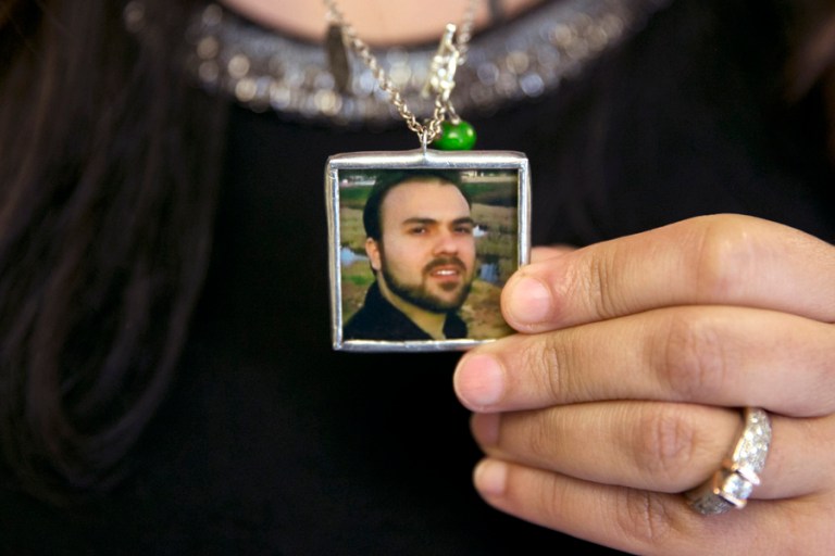 Naghmeh Abedini, holds a necklace with a photograph of her husband, Saeed Abedini. Saeed Abedini met with Rep. Robert Pittenger, R-N.C., on Tuesday at a U.S. military hospital in Landstuhl, Germany, where he has been receiving medical treatment and evaluation. (AP file photo/Jacquelyn Martin)