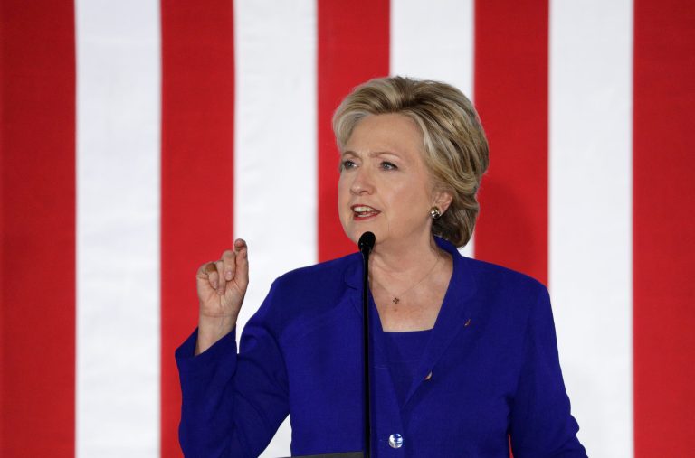 Clinton expressed sadness for the victims before pivoting to concerns about police respecting Americans. (AP Photo/John Locher)
