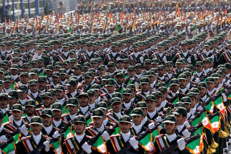 FILE - In this Friday, Sept. 21, 2012 file photo, Iran's Revolutionary Guard troops march during a military parade commemorating the start of the Iraq-Iran war 32 years ago, in front of the mausoleum of the late revolutionary leader Ayatollah Khomeini, just outside Tehran. (AP File)