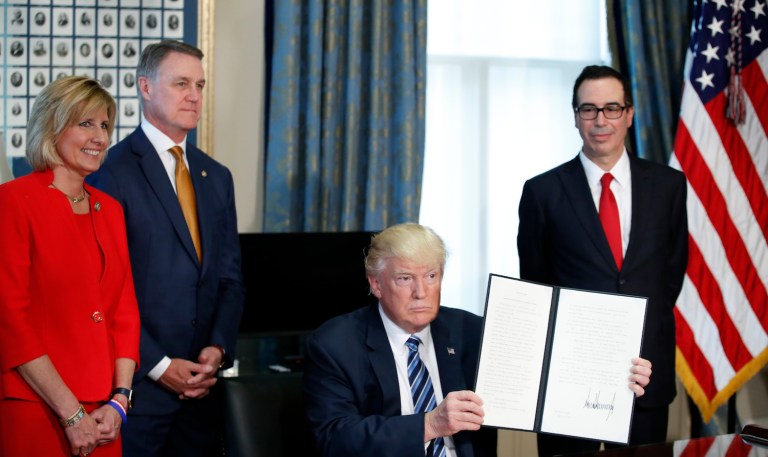 Trump called the 2010 Dodd-Frank law a set of 