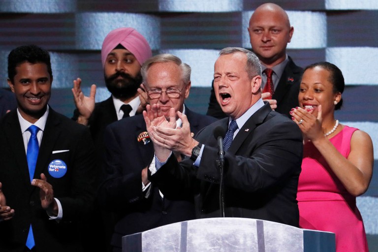 Retired Gen. John Allen stands with veterans as he speaks during the final day of the Democratic National Convention in Philadelphia. (AP Photo/J. Scott Applewhite)