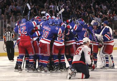 Bruce Bennett/Getty ImagesThe Rangers scored a goal with seven seconds left in regulation and 1:35 into overtime in Monday night's win over the Capitals.