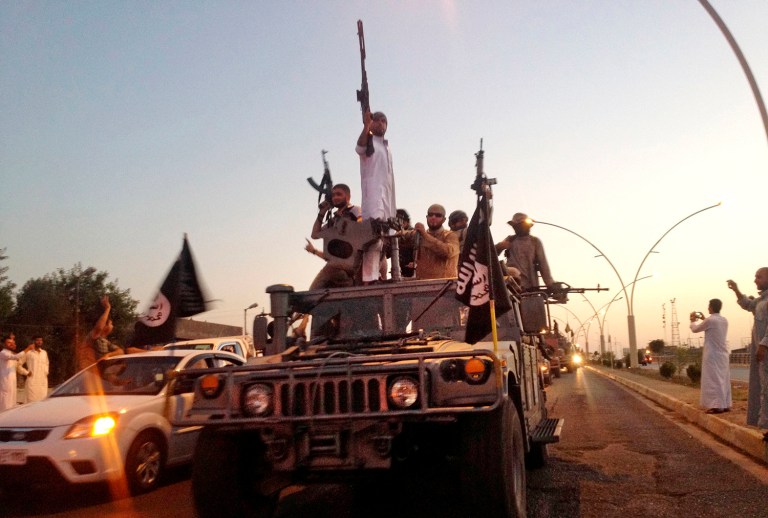 The U.S. military says it has video evidence that shows the Islamic State has been rounding up groups of Iraqis in Mosul, forcing them into buildings at gunpoint, and then using the buildings as firing positions. (AP Photo, File)
