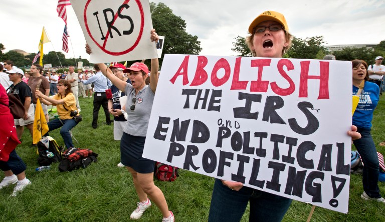 The Department of Justice has settled cases now pending approval by district courts involving Tea Party groups who claim their tax-exempt status was delayed by the IRS because of their connection to conservative ideals.(AP Photo/J. Scott Applewhite)
