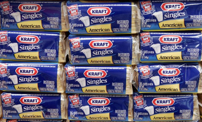 FILE - In this July 24, 2006, file photo,  packages of Kraft Singles are displayed in Chicago.  Kraft is removing artificial preservatives from its most popular individually wrapped cheese slices, in the latest sign that companies are tweaking recipes as food labels come under greater scrutiny. (AP Photo/Charles Rex Arbogast, file)