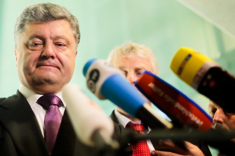 Ukrainian presidential candidate and businessman Petro Poroshenko briefs the media after a meeting with Germany's Christian Union's faction law makers in Berlin, Germany, Wednesday, May 7, 2014. The Ukrainian government is planing a presidential election on May 25, 2014. (AP Photo/Markus Schreiber)