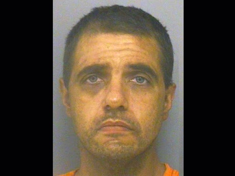 This booking photo released by the Calhoun County, Mich., sheriffâs department shows Chris Wahmhoff, who faces trespassing and interfering with police charges after a 10-hour protest in June inside an oil pipeline under construction near Marshall, Mich. (AP Photo/Calhoun County Sheriffâs Department)