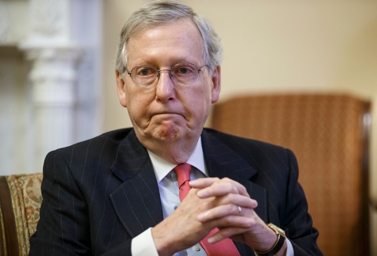 Senate Majority Leader Mitch McConnell faces a nearly impossible task this election year: protecting Senate Republicans from the political upheaval of Donald Trump's presidential campaign. (AP Photo/J. Scott Applewhite, File)