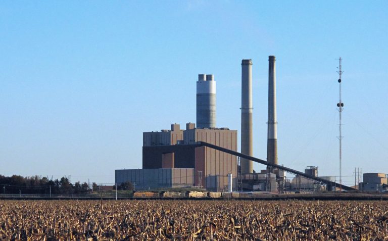 FILE - In this Nov. 13, 2013 file photo, the Ameren Corp. coal-fired power plant is seen outside the southern Illinois town of Newton. Illinois officials say the state will need a mix of power sources and energy efficiency initiatives to meet proposed federal limits for carbon pollution. On Monday, June 2, 2014, the Obama administration unveiled a plan to cut carbon dioxide emissions from power plants by 30 percent by 2030.  About 40 percent of Illinois' energy comes from coal.  (AP Photo/Jim Suhr, File)
