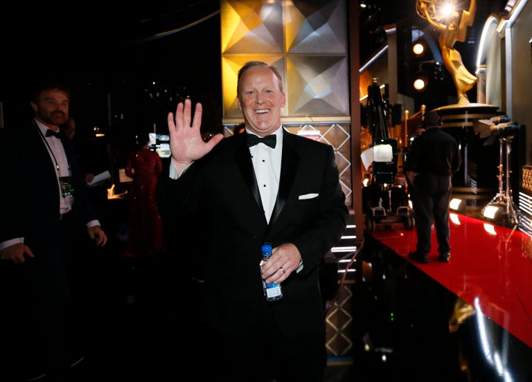 Sean Spicer poses on the red carpet stage at the 69th Primetime Emmy Awards on Sunday, Sept. 17, 2017, at the Microsoft Theater in Los Angeles. (Photo by Danny Moloshok/Invision for the Television Academy/AP Images)