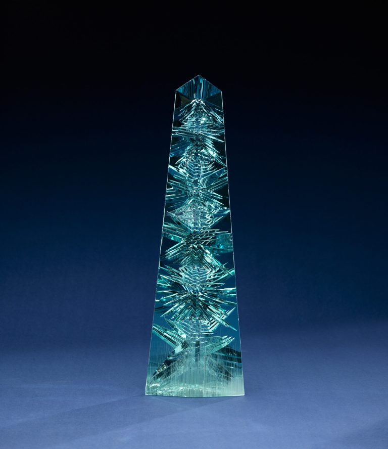   This undated handout photo provided by the Smithsonian Institution shows the obelisk-shaped Dom Pedro gem. The world's largest cut aquamarine gem will soon go on display in its new home at the Smithsonian's National Museum of Natural History in Washington. The museum will unveil the obelisk-shaped Dom Pedro gem Thursday for long-term display. The blue-green crystal was mined in Brazil in the late 1980s and is named for Brazil's first two emperors. (AP Photo/Don Hurlbert, Smithsonian Institution)  