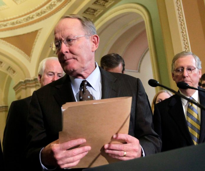 The chief of staff of Sen. Lamar Alexander, R-Tenn., has been put on leave following a search of his home by law enforcement officials. (AP File)