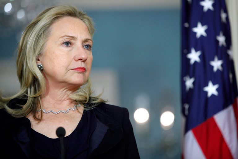 Secretary of State Hillary Clinton listens to a question from the media during a news conference with Danish Foreign Minister Villy Sovndal, Thursday, Dec. 15, 2011, at the State Department in Washington. (AP Photo/Jacquelyn Martin)
