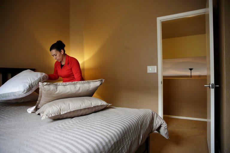 City Council members should consider the benefits that home sharing services provide - to hosts, guests and the city. (AP Photo/John Locher)