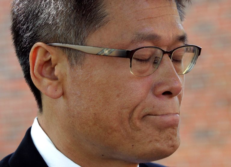 In this May 3, 2014, HOLD FOR USE WITH STORY SLUGGED SOUTH KOREA SHIP SINKING  BY TODD PITMAN, Park Jong-dae, father of Danwon High School Junior, Park Su-hyun, who was killed in the sinking of ferry Sewol, closes his eyes during an interview in Ansan, South Korea. (AP Photo/Ahn Young-joon)