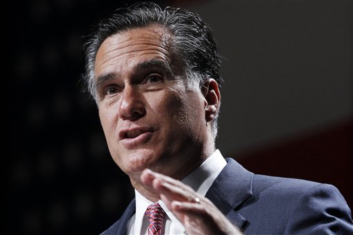 Republican presidential candidate Mitt Romney is walking back from claims that President Obama's health care mandate is a tax. (AP photo)