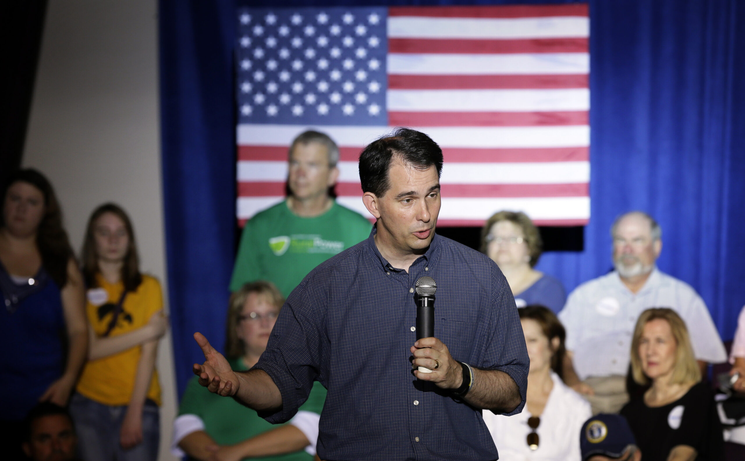 Walker says he supported path to citizenship, but not amnesty
