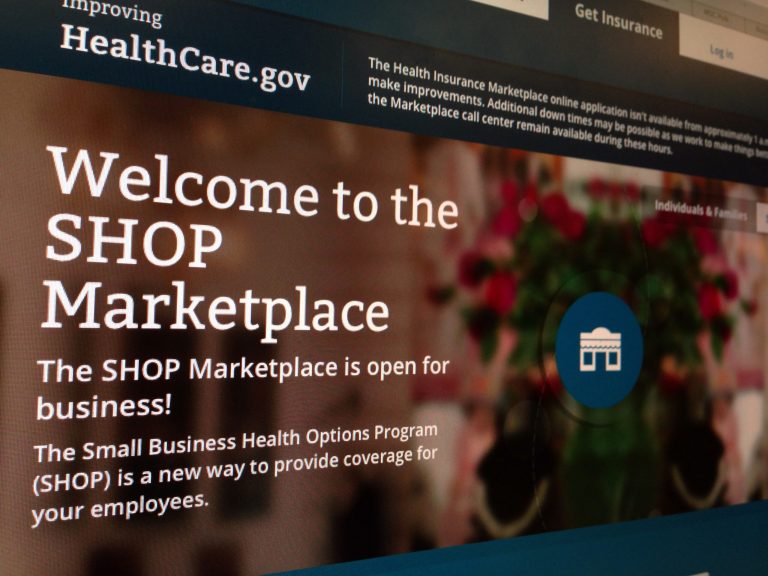 FILE - This Nov. 27, 2013, file photo shows part of the HealthCare.gov website page featuring information about the SHOP Marketplace is photographed in Washington, on Nov. 27, 2013. Trying to limit election-year damage on health care, the Obama administration Monday, Feb. 10, 2014, granted business groups another delay in a much-criticized requirement that larger firms cover their workers or face fines. (AP Photo/Jon Elswick, File)