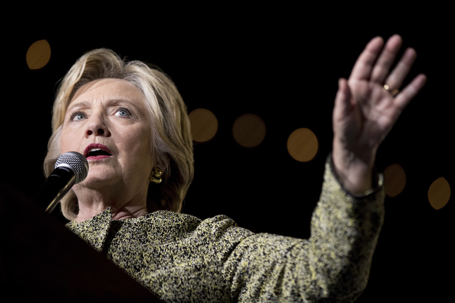 Clinton not showing her hand on business taxes, adviser says