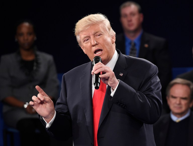 Donald Trump hit back at House Speaker Paul Ryan on Monday, just hours after the Wisconsin Republican said he would no longer defend the GOP presidential nominee. (Saul Loeb/Pool via AP)