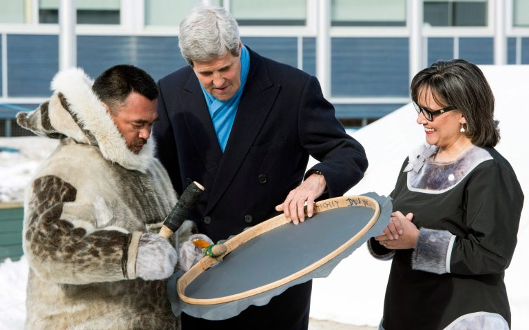 United States Secretary of State John Kerry, center, and Leona Aglukkaq, Canadian Minister for the Arctic Council, right, chat with a traditional Inuit drummer while attending the Arctic Council Ministerial meeting Friday, April 24, 2015, in Iqaluit, Nunavut. Ministers from the eight Arctic nations and the leaders of northern indigenous groups form the Council. (Paul Chiasson/The Canadian Press via AP) 