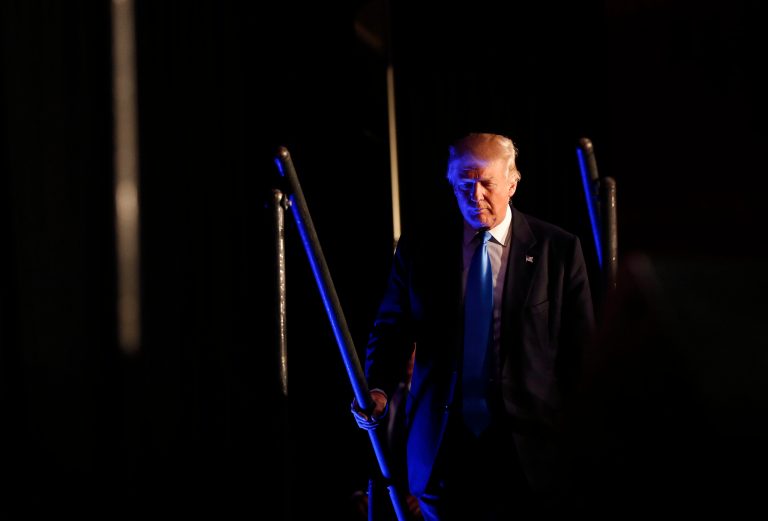 Different devices used could mean that aides issued the corrective tweet. (AP Photo/Gerald Herbert)