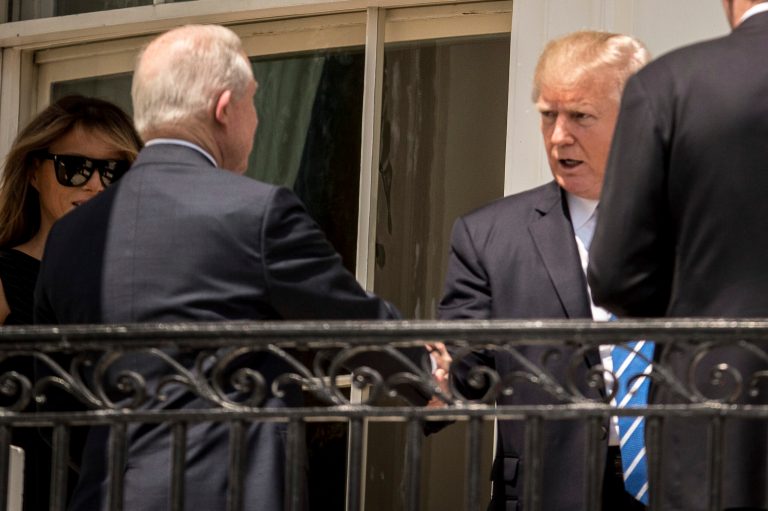 President Donald Trump greets Attorney General Jeff Sessions as they arrive to view the solar eclipse, Monday, Aug. 21, 2017, at the White House in Washington. (AP Photo/Andrew Harnik)