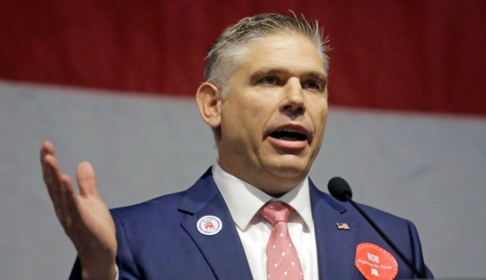 Utah Republican Party chairman Rob Anderson spoke out against Mitt Romney's candidacy in an Wednesday interview, saying: "I think he's keeping out candidates that I think would be a better fit for Utah because, let's face it, Mitt Romney doesn't live here, his kids weren't born here, he doesn't shop here." (AP Photo/Rick Bowmer, File)