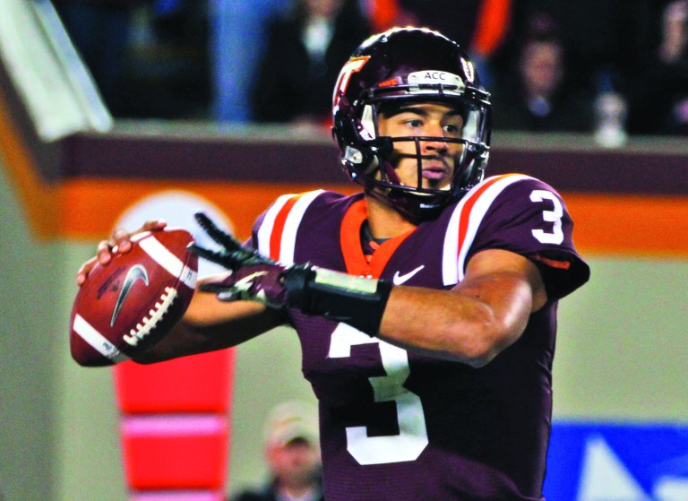 Steve Helber/AP
Virginia Tech quarterback Logan Thomas has 14 touchdowns and 14 interceptions this season.
