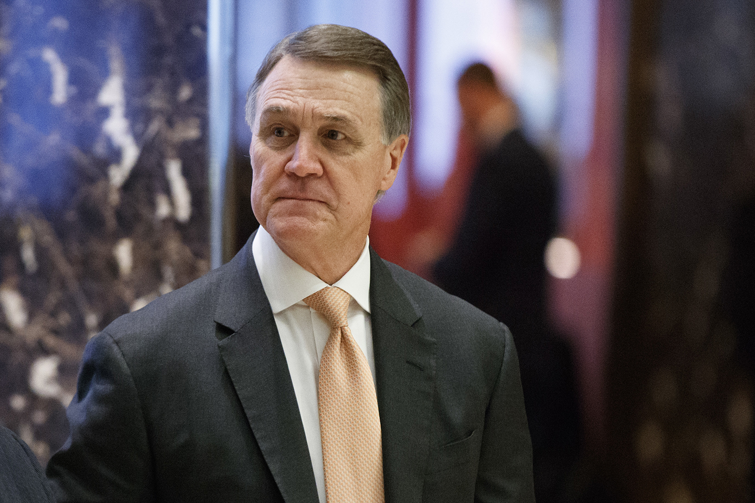 Georgia Sen. David Perdue grabs student’s phone while being asked about voter suppression