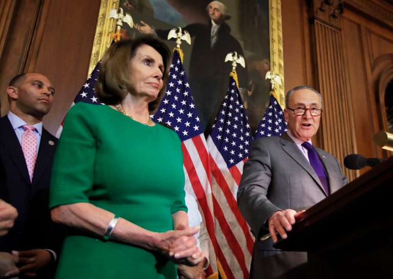 Senate Minority Leader Chuck Schumer of N.Y., right, with House Minority Leader Nancy Pelosi of Calif. and Rep. Hakeem Jeffries, D-N.Y., back left, speaks to reporters about President Donald Trump's first 100 days, during a news conference on Capitol Hill in Washington, Friday, April 28, 2017. Pelosi and Schumer are eager to take back control of their chambers in the 2018 election. (AP Photo/Manuel Balce Ceneta)