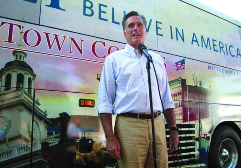 Evan Vucci/AP
Republican presidential candidate Mitt Romney speaks to supporters as part of his six-state bus tour in Holland, Mich., on Tuesday.