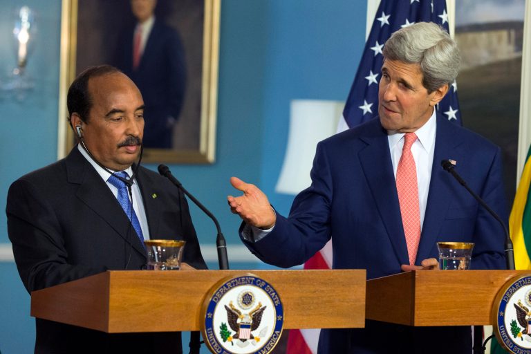 Secretary of State John Kerry, right, looks to Mauritanian President Mohamed Ould Abdel Aziz,  as he speaks to media at the State Department, in Washington, Monday, Aug. 4, 2014, before a bilateral meeting at the US Africa Summit. Nearly 50 African heads of state are gathering in Washington for an unprecedented summit. (AP Photo/ Evan Vucci)