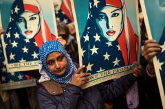 White House postpones travel ban order until next week