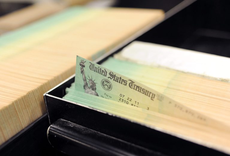 In this photo illustration U.S. Treasury checks are piled at the U.S. Treasury printing facility July 18, 2011 in Philadelphia, Pennsylvania. (Photo Illustration by William Thomas Cain/Getty Images)