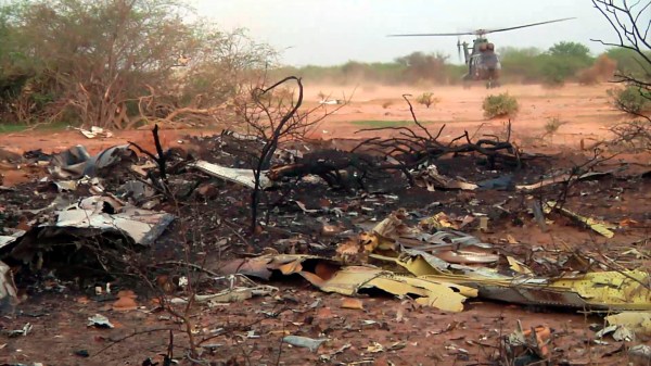 Teams converge on remote site to probe plane crash