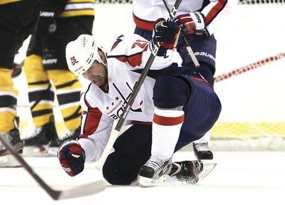 BOSTON, MA-APRIL 25: Matt Hendricks#26 of the Washington Capitals celebrates a goal in the first period against the Boston Bruins in Game Seven of the Eastern Conference Quarterfinals during the 2012 NHL Stanley Cup Playoffs at TD Garden on April 25, 2012 in Boston, Massachusetts.(Photo by Elsa/Getty Images)