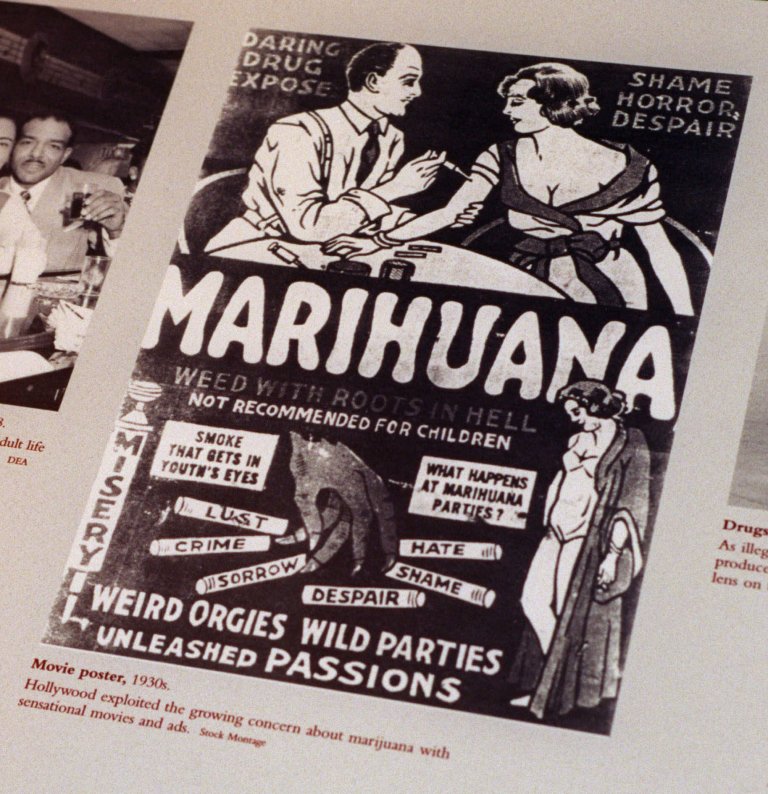   FILE - This undated file photo provided by the Drug Enforcement Administration shows a 1930s anti-marijuana movie poster as part of an exhibit at the DEA Museum and Visitors Center which opened May 10, 1999 in Arlington, Va. After the repeal of alcohol prohibition in 1933, Harry Anslinger, who headed the Federal Bureau of Narcotics, turned his attention to pot. He told of sensational crimes reportedly committed by marijuana addicts. 