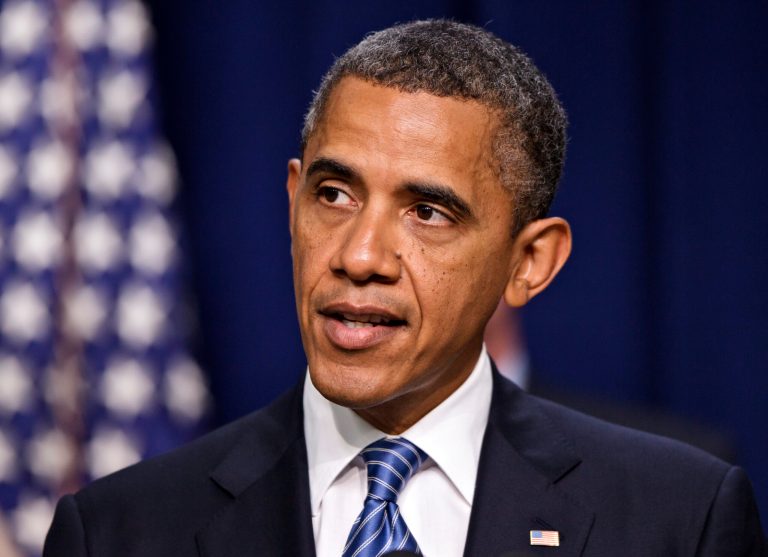 President Barack Obama talks abut taxes, Friday, August 3, 2012, in Eisenhower Executive Office Building on the White House campus in Washington.   (AP Photo/J. Scott Applewhite)